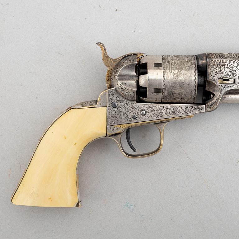 A percussion revolver, Colt 1851 Navy, in case, from the year 1863.