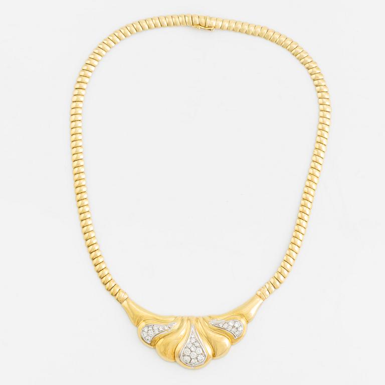 An 18K gold necklace set with round brilliant-cut diamonds.