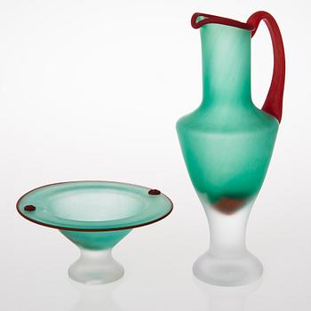 A glass bowl and decanter, signed, Kosta Boda, second half of 20th Century.