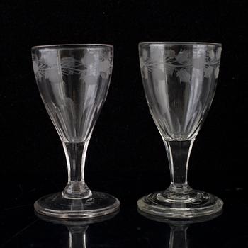 Twelve early 19th century wine glasses.