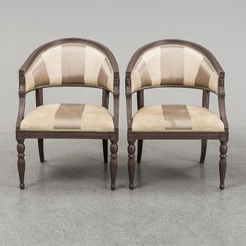 A pair of contemporary chairs in Neo classical style.