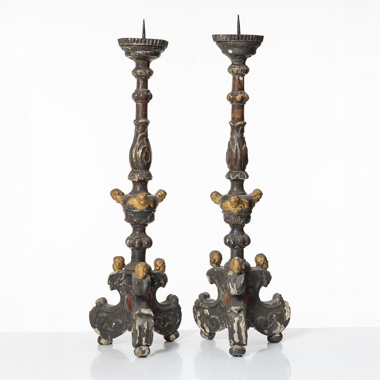 A pair of Baroque style candleholders, 19th Century.