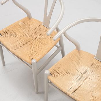 Hans J. Wegner, a pair of model 'CH-24' chairs, Carl Hansen & Søn, Denmark.