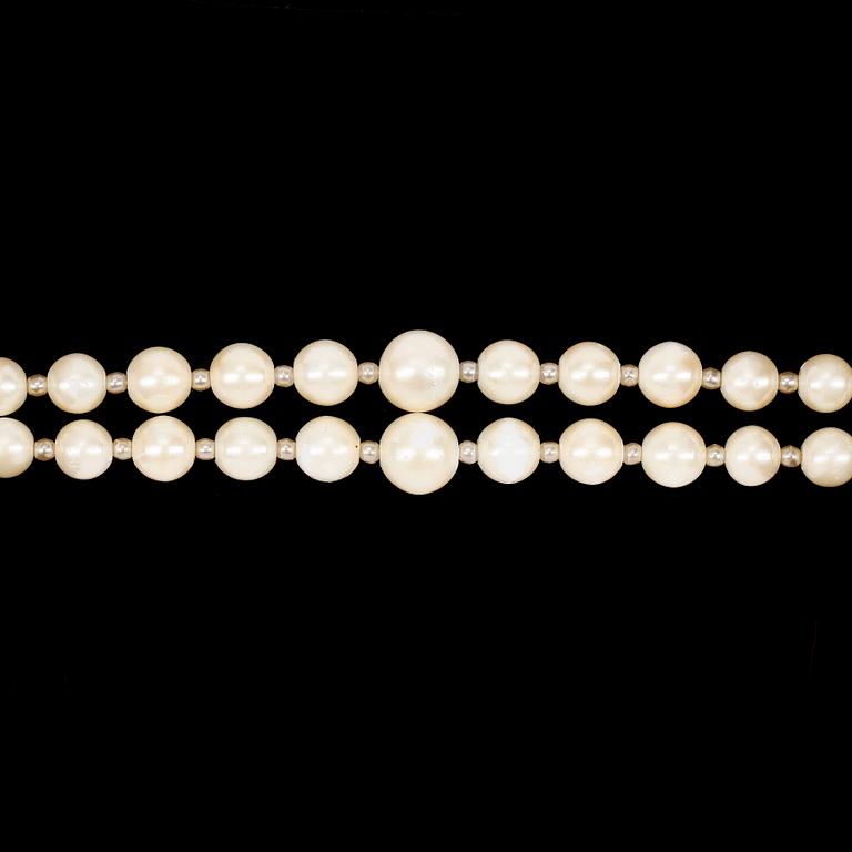 A necklace by Christian Dior with two strand decorativ pearls.