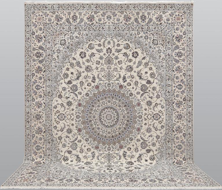 A Nain part silk carpet, 408 x 308 cm.