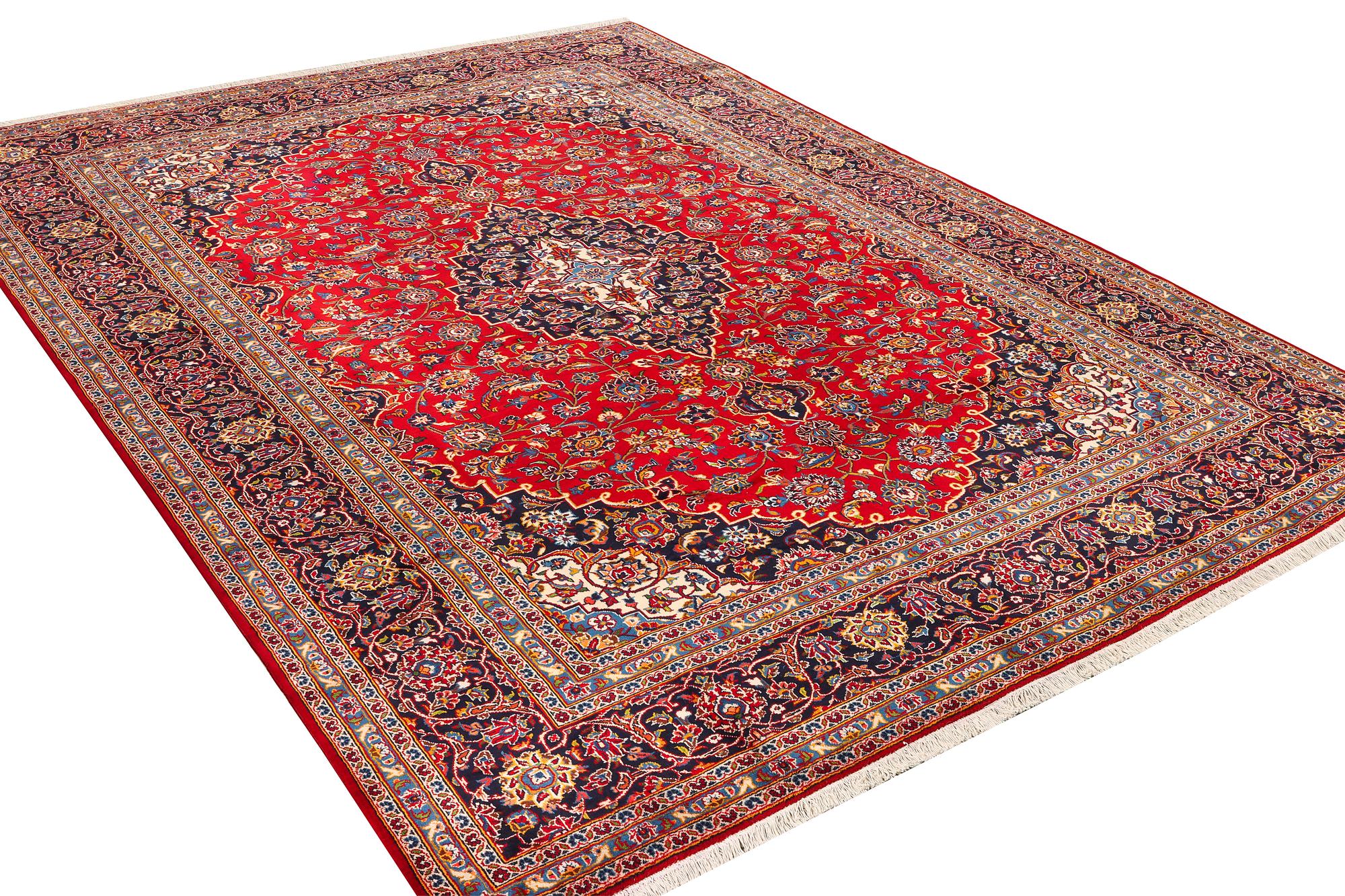 A Keshan carpet, c. 405 x 300 cm.