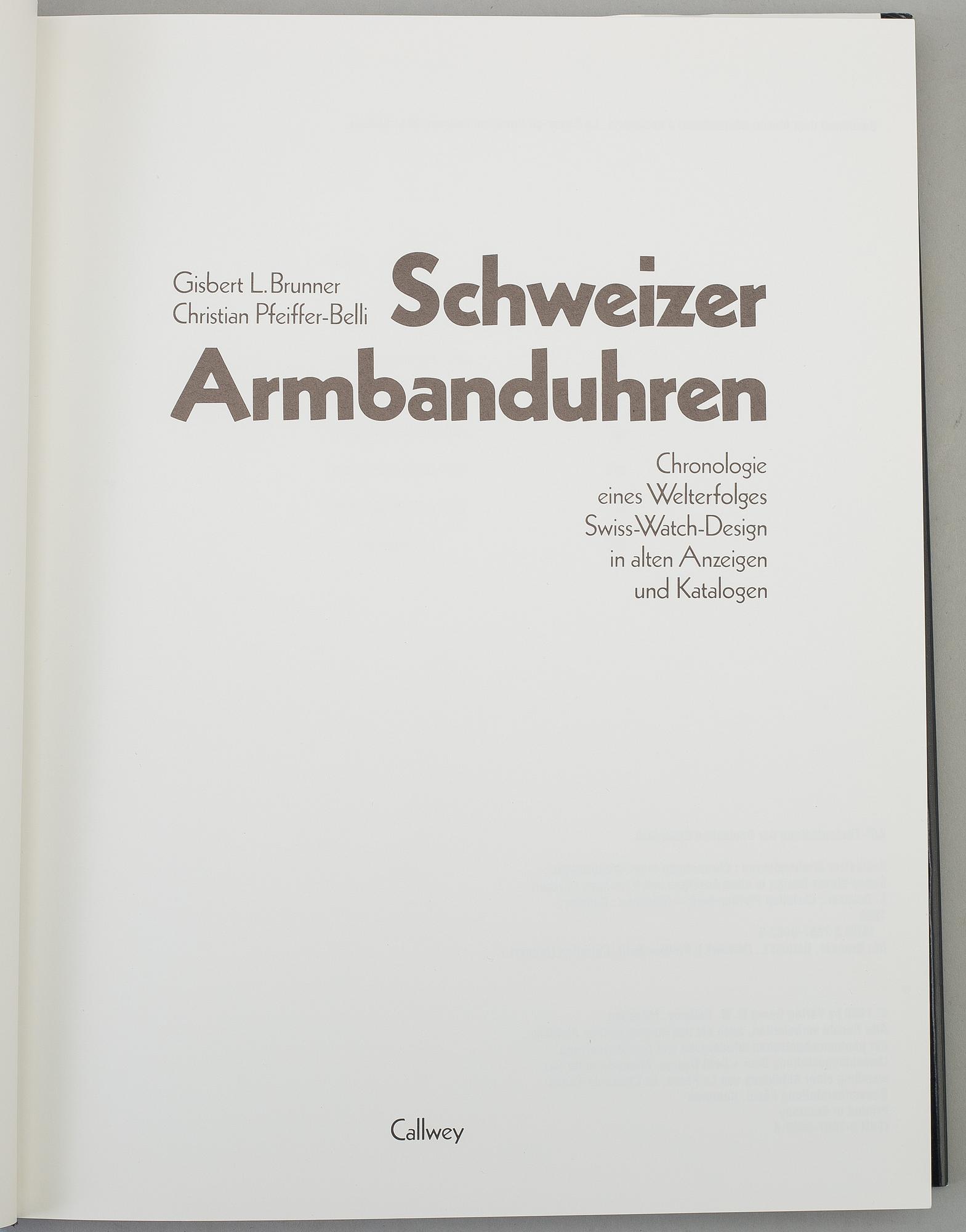 A set of 5 watch books.