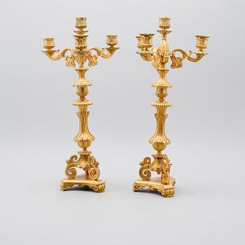 KANDELABRAR, 2 st, förgylld brons, senempire, 1800-talets mitt.