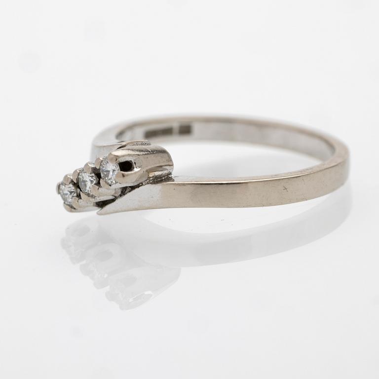 18K white gold ring with diamonds.