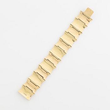 A 14K gold bracelet.