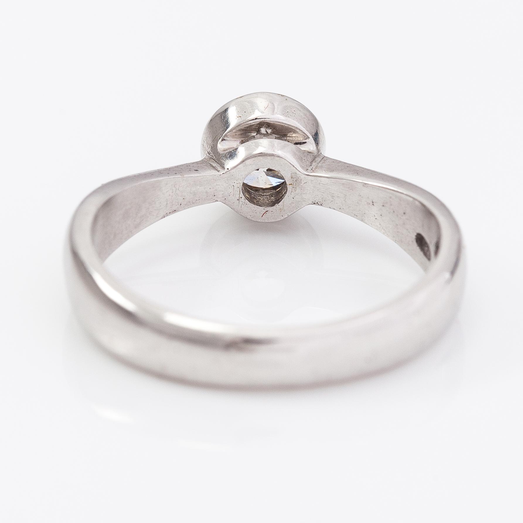 A 14K white gold ring with a ca. 0.50 ct diamond according to engraving.
