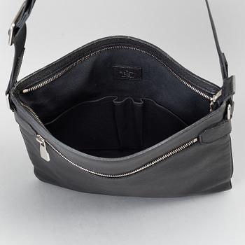 LOUIS VUITTON, a black Taiga bag, 2012.