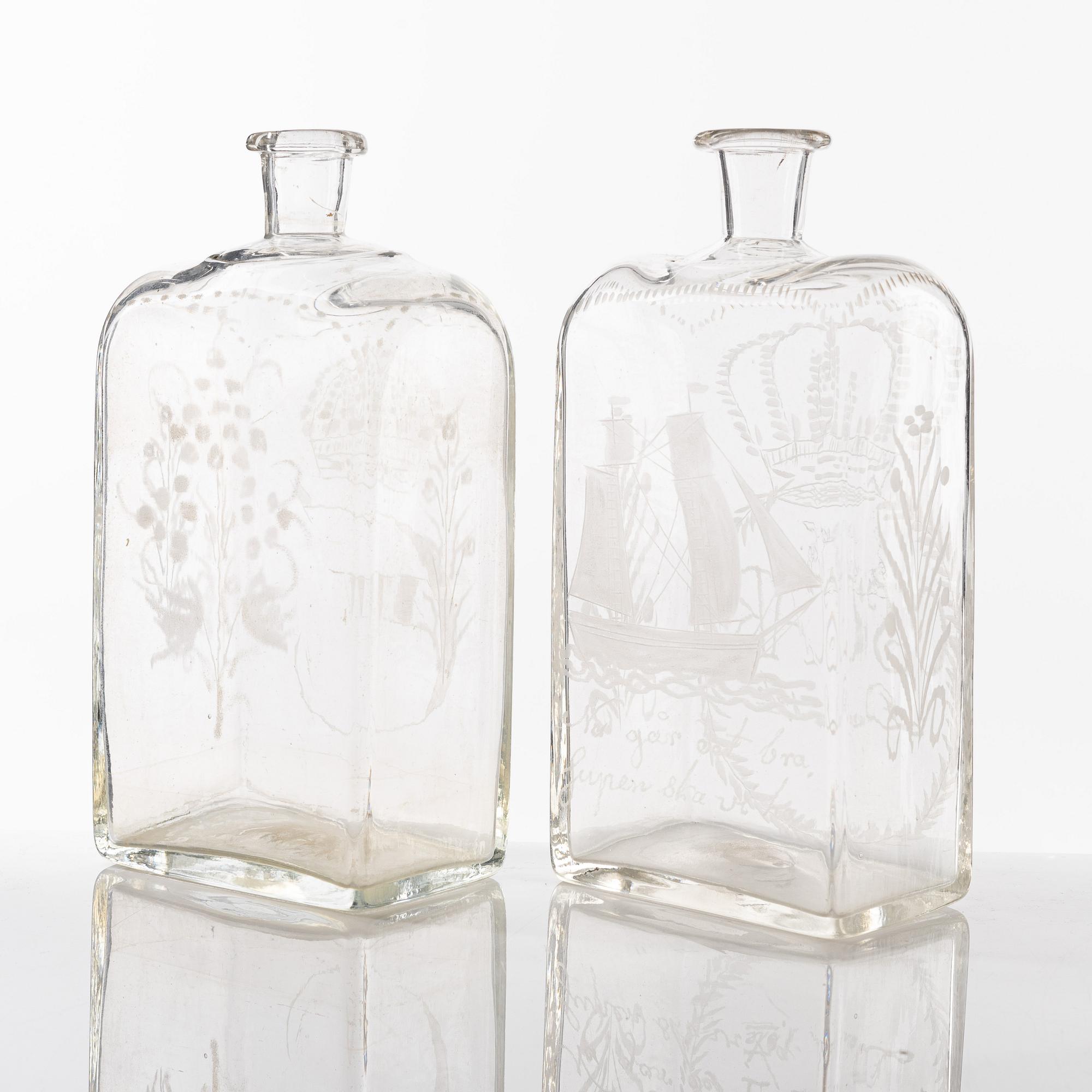 A set of seven glass bottles, 19th Century/circa 1900.