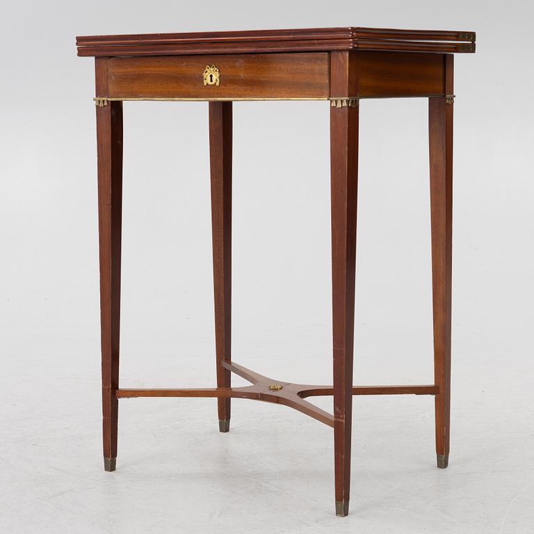 A late Gustavian style games table/sewing table, early 20th century.