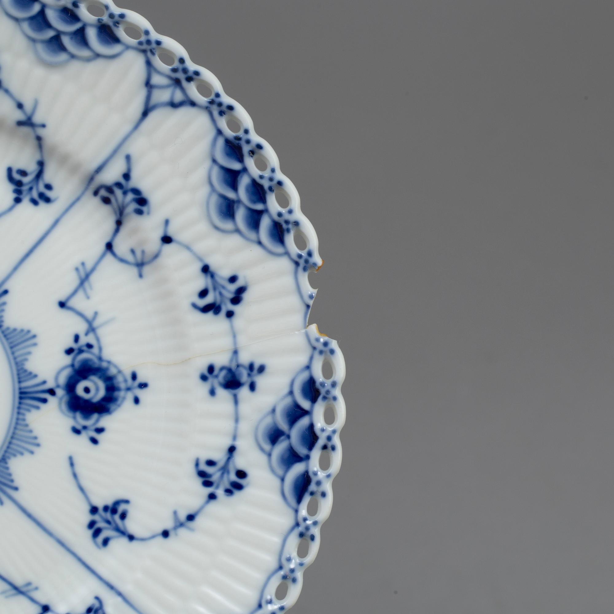 A set of six coffee cups with saucers and five plates, "Musselmalet"by Royal Copenhagen.