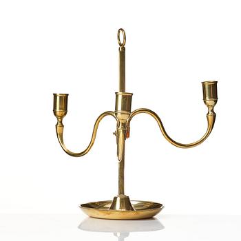 A Gustavian brass three light candelstick.