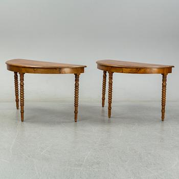 A two-piece birch dining table from around the year 1900.