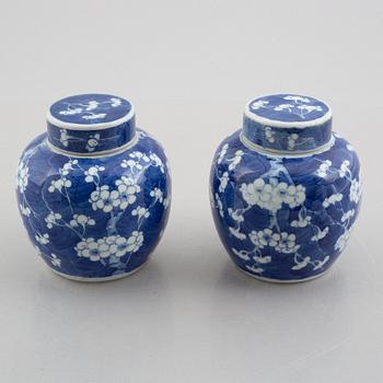 A pair of blue and white pots with covers, China, late Qing dynasty.