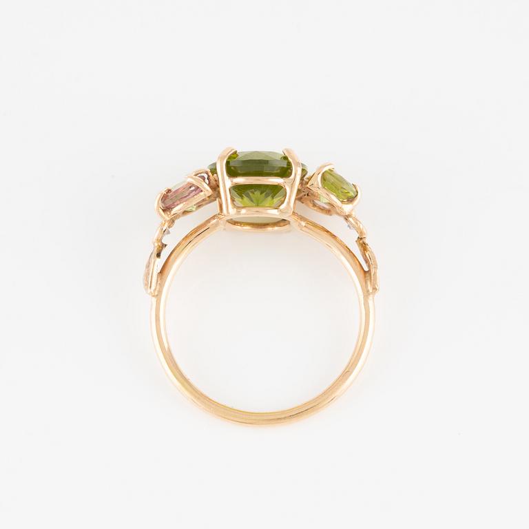 Ring with peridot, pink and green tourmaline, and brilliant-cut diamonds.