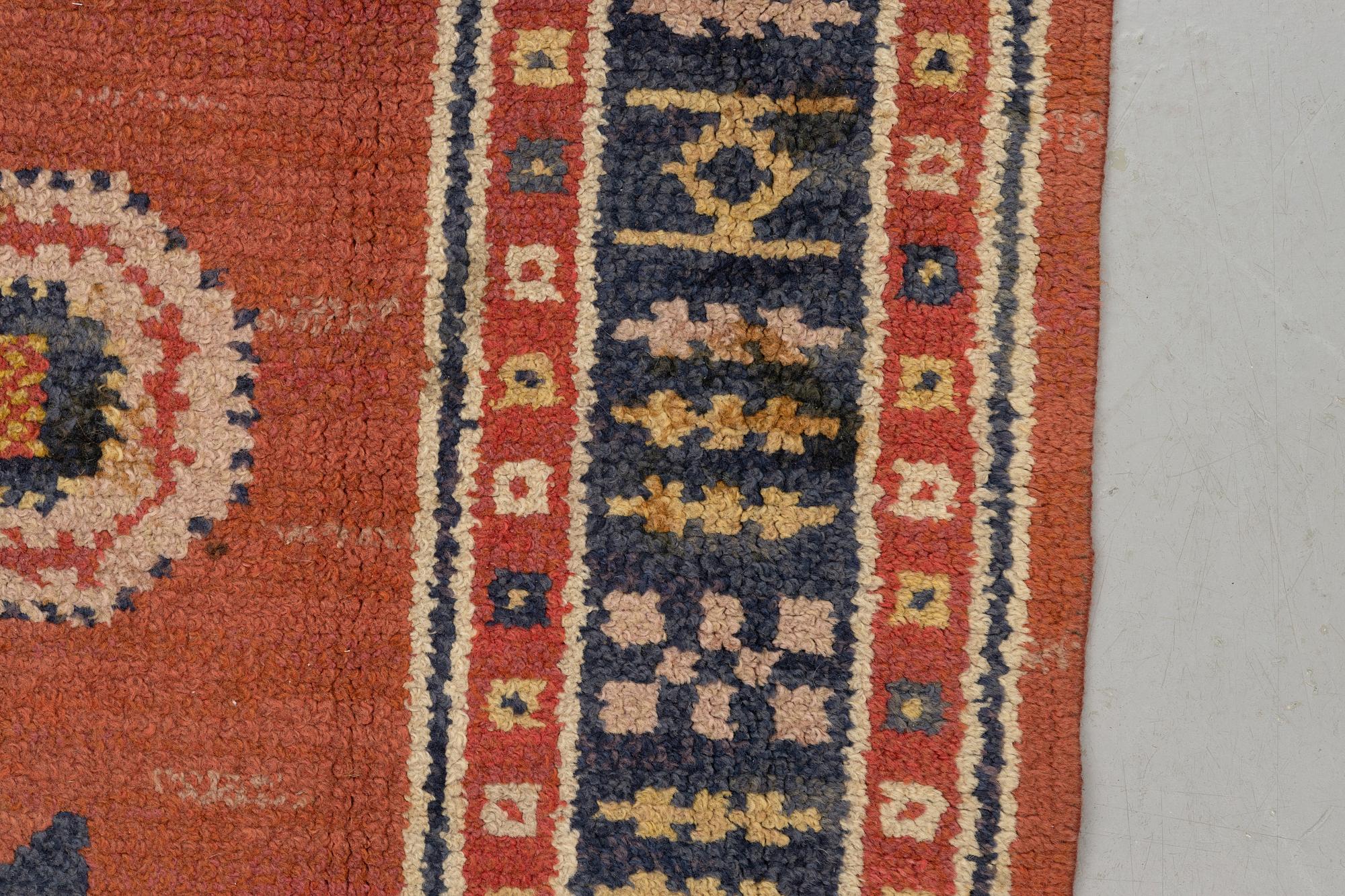 Märta Måås-Fjetterström, a carpet, "Röd Flossa", knotted pile, ca 300 x 272 cm, signed AB MMF.
