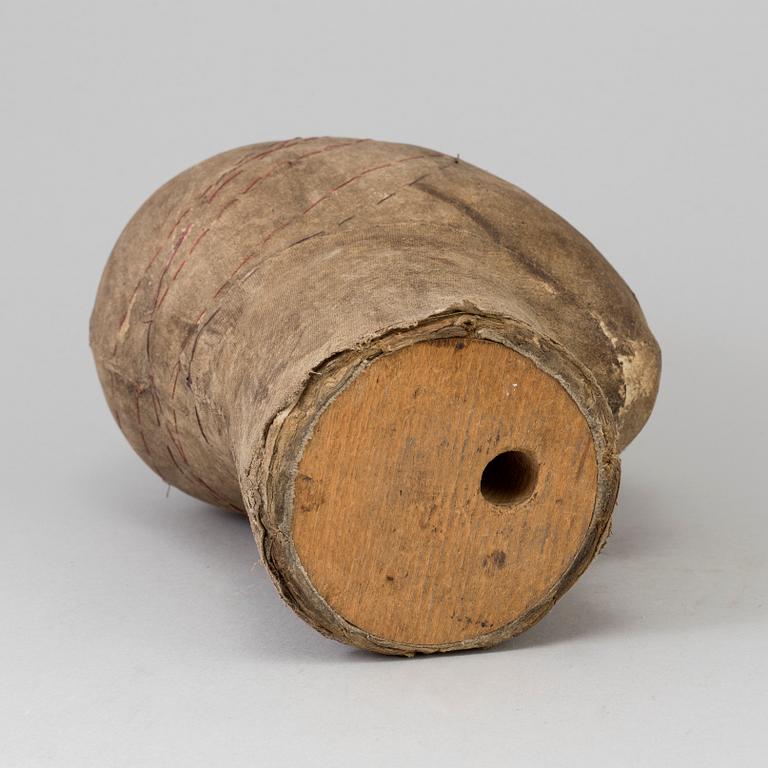 A 19TH CENTURY WIG STAND, covered in linen.