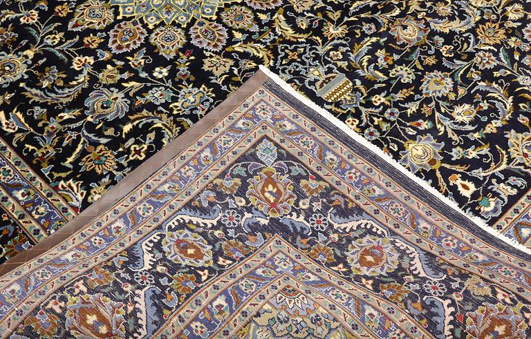 A Kashmar carpet, approx. 335 x 248 cm.