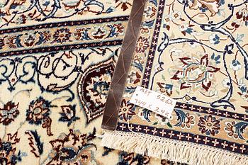 A part silk Nain carpet, 9LA, a. 344 x 245 cm.