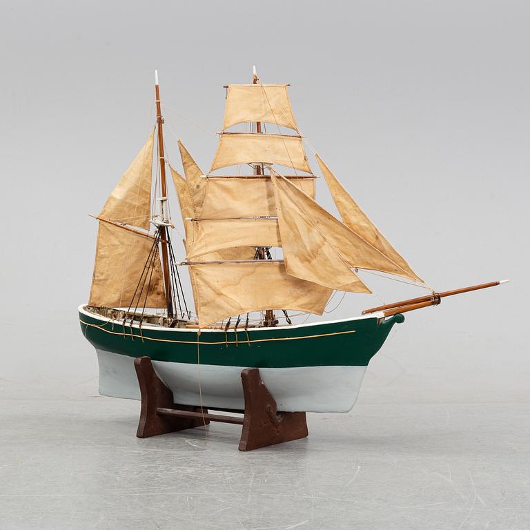 A model of a ship, mid 20th century.