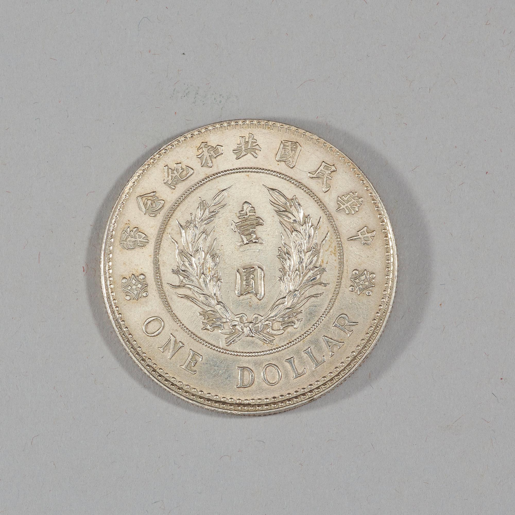A box with five silver coins, Republic, early 20th Century.