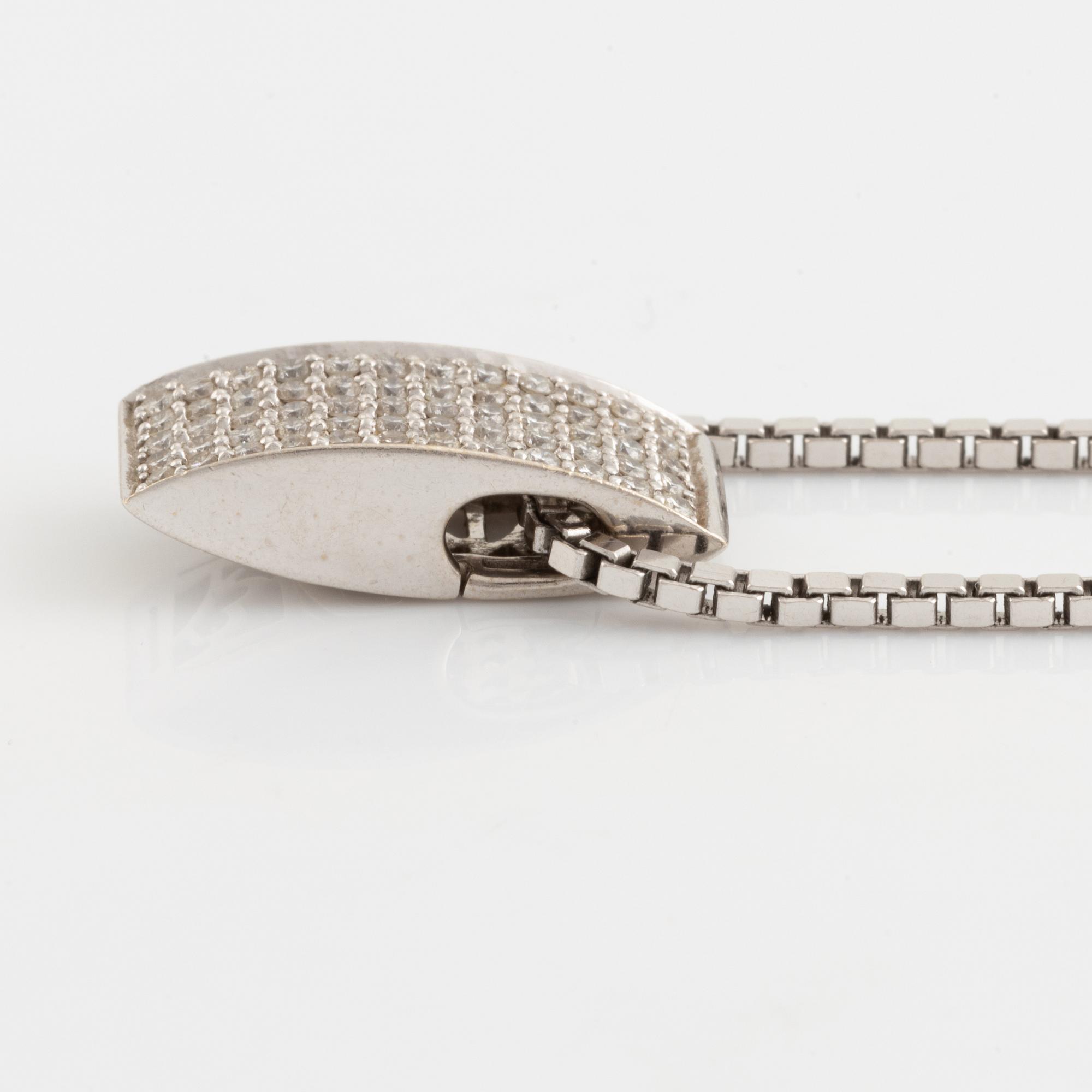 White gold and brilliant cut diamond necklace.
