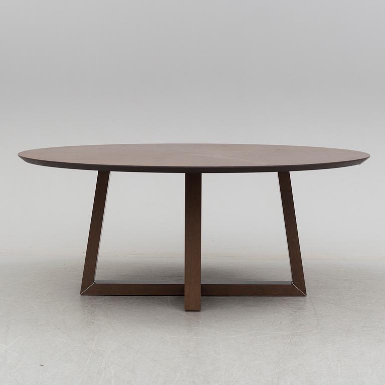 A circa 2000 dining table by Natuzzi, Italy.