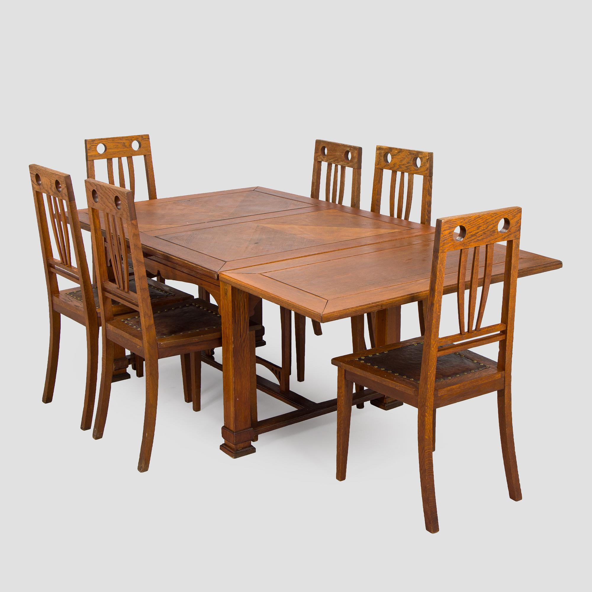 Dining table and six chairs, early 1900.