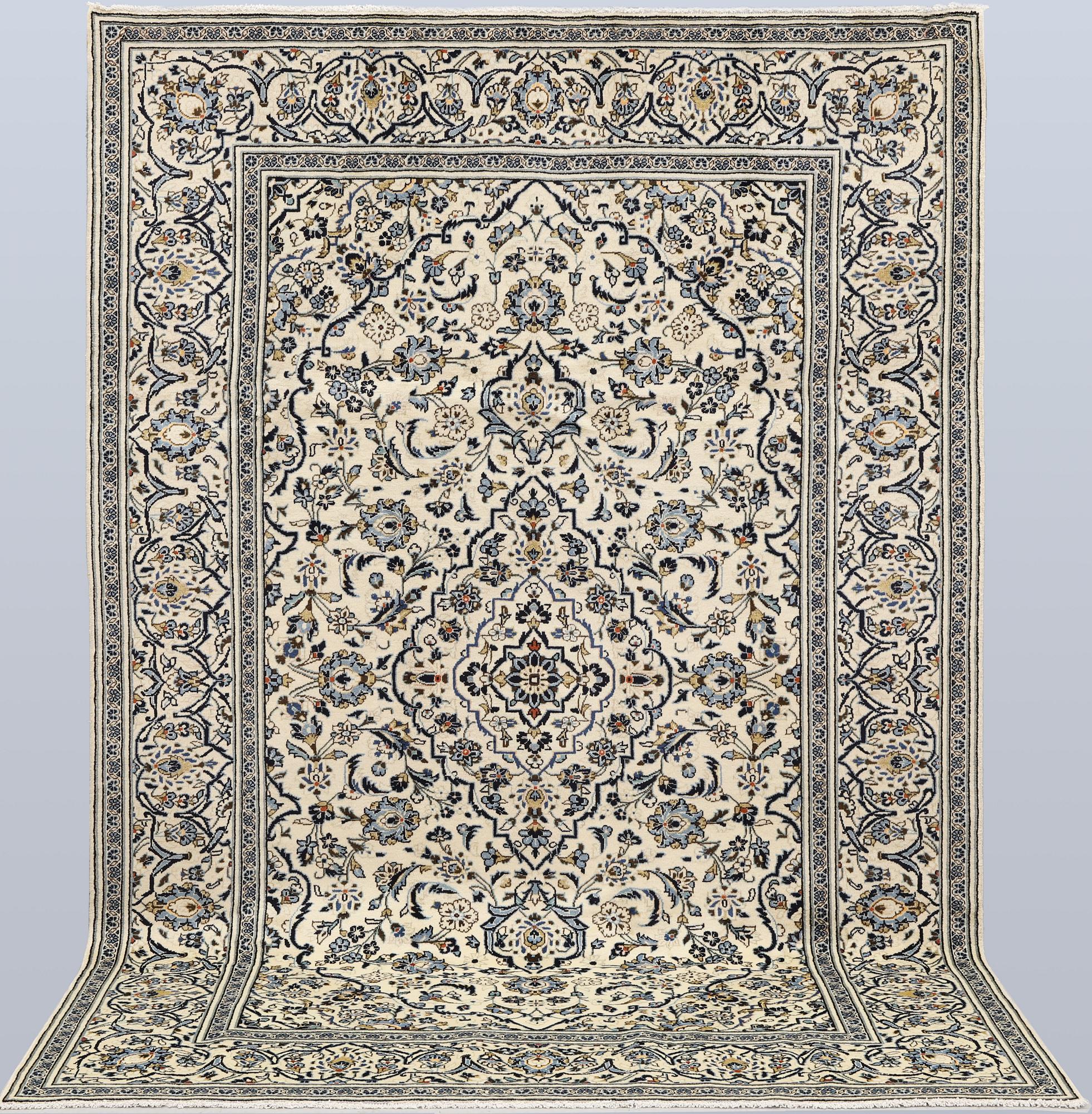 A Keshan carpet, approx. 302 x 203 cm.