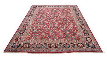 A carpet, Mashad, signed, ca 395 x 300 cm.