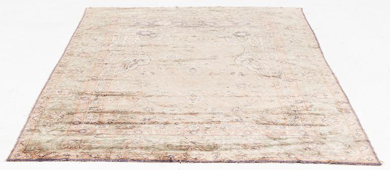 A Turkish rug, c. 185 x 125 cm.