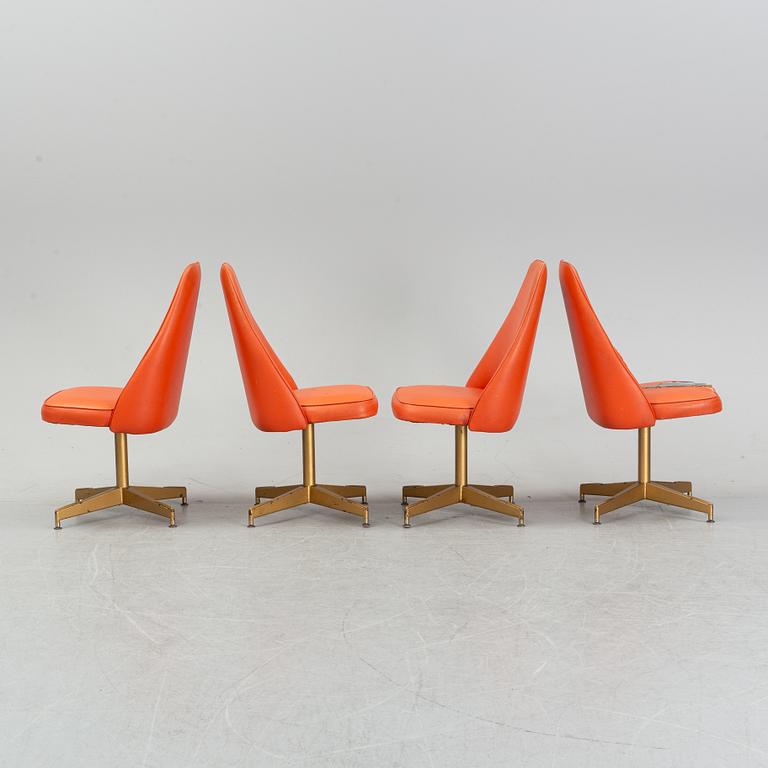 A dining table with four chairs, Walter of Wabash, table dated 1960.
