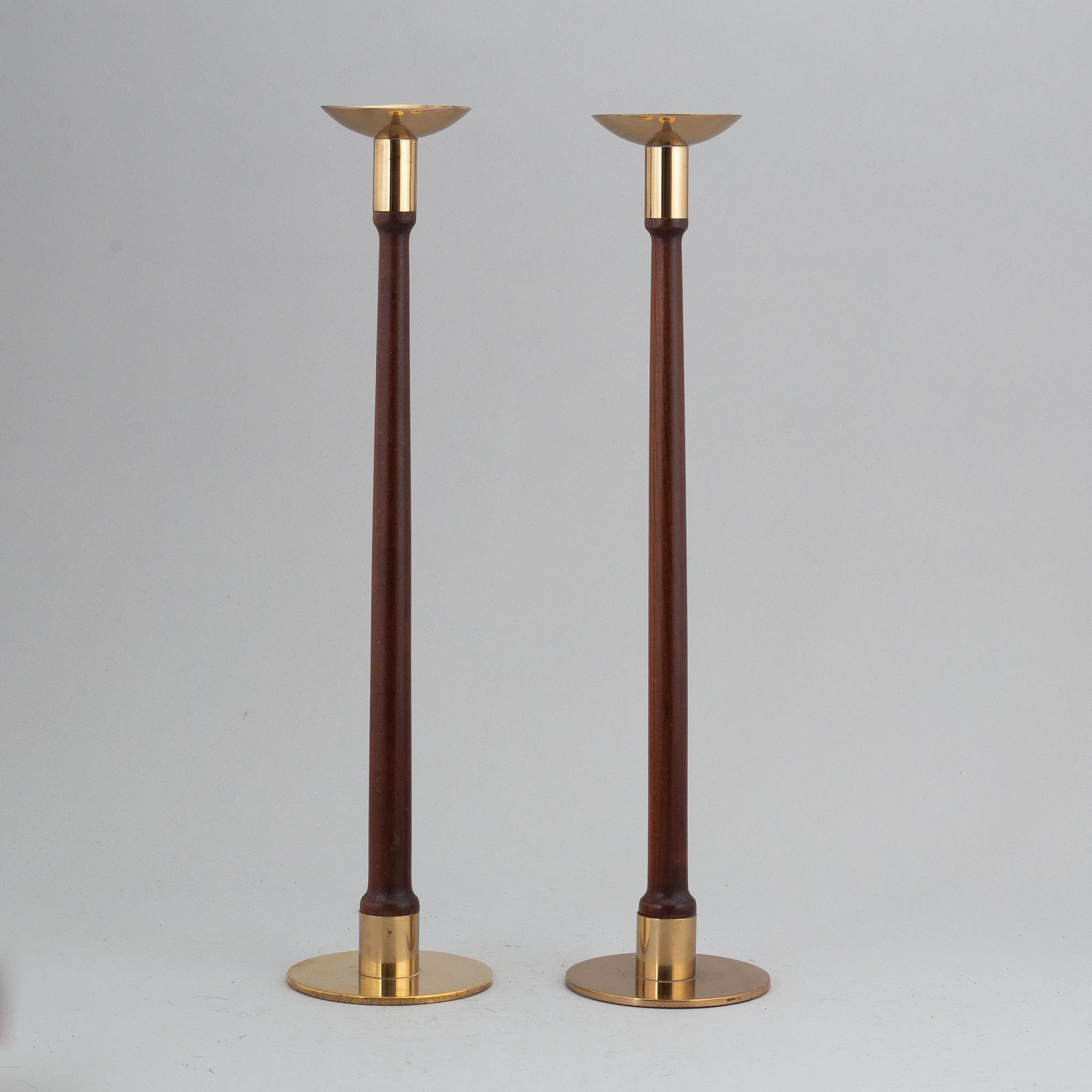 HANS-AGNE JAKOBSSON, a pair of brass and teak candle holders, Markaryd, mid 20th century.