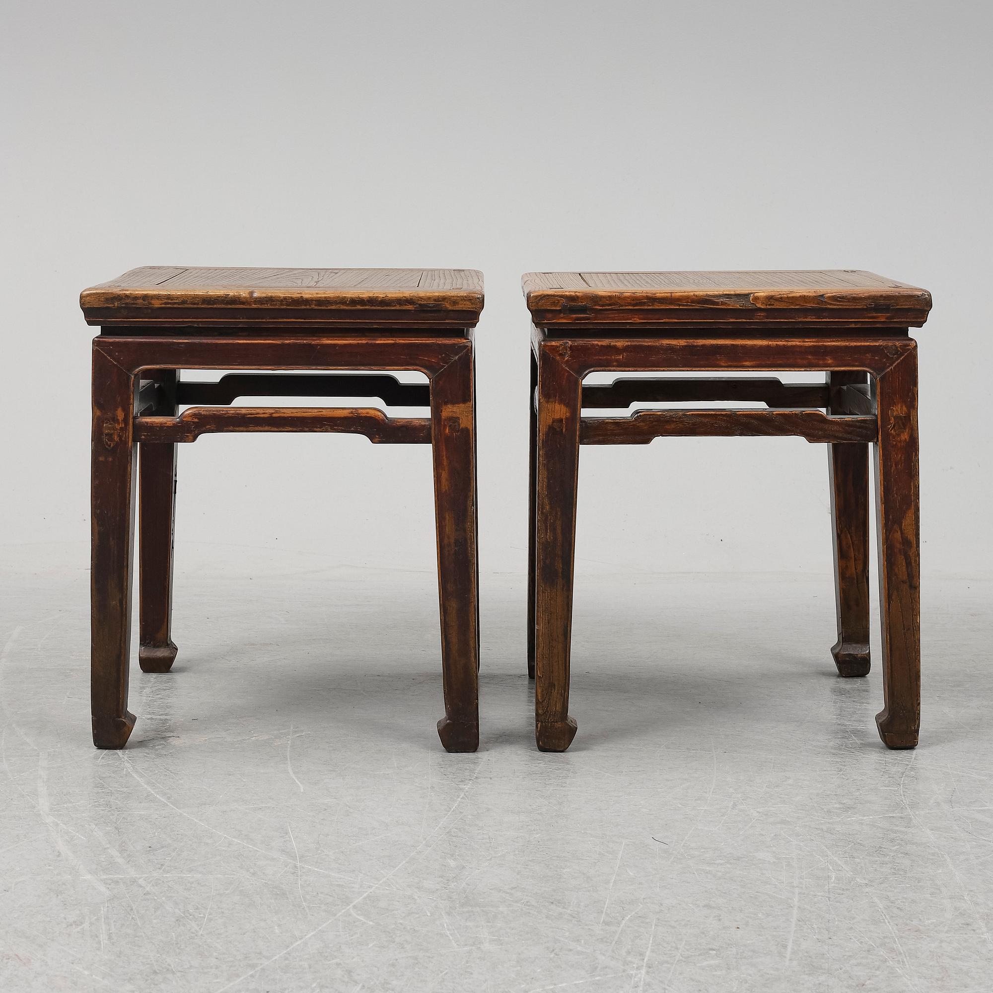 A pair of hardwood tables, 20th century.