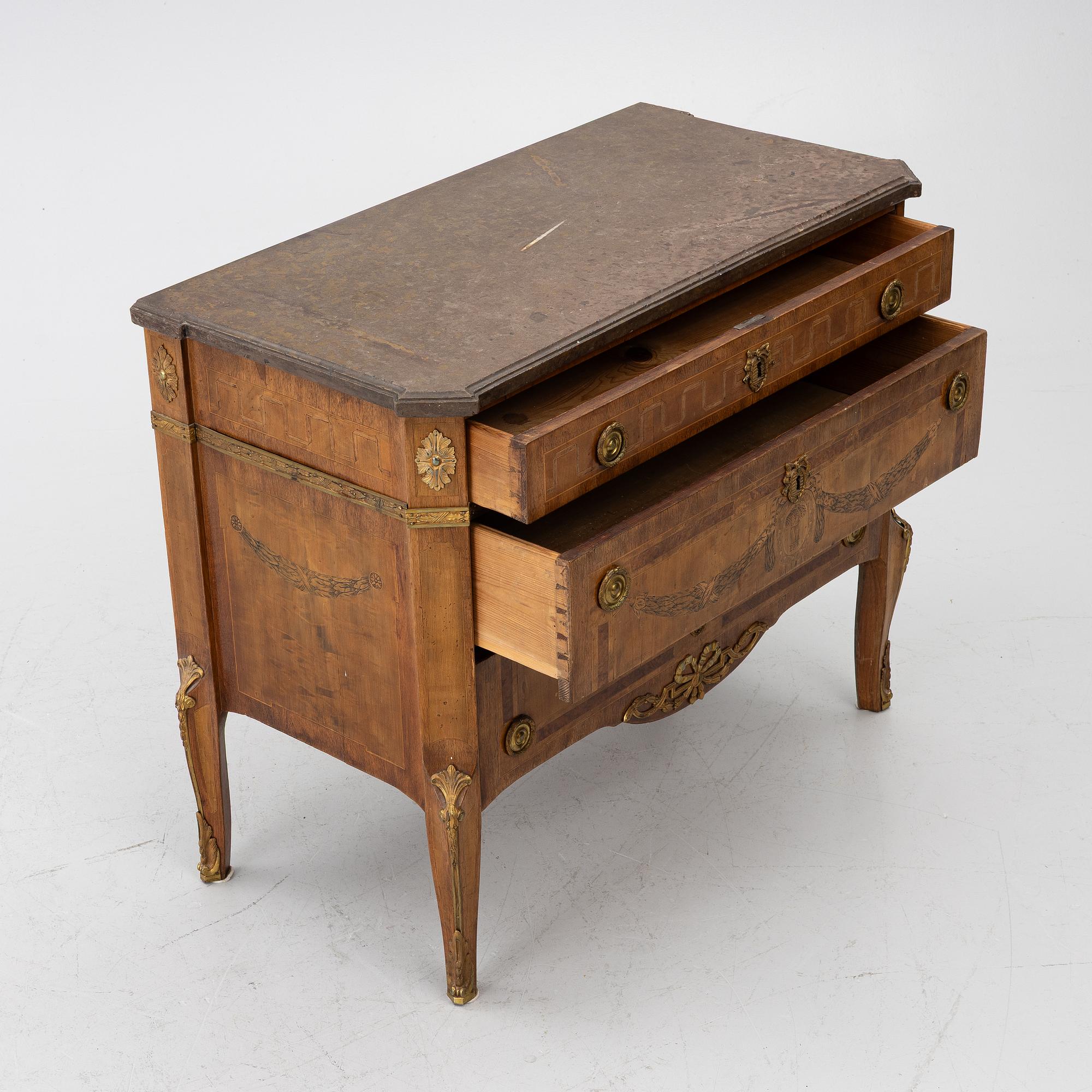 A Gustavian marquetry commode, Stockholm, late 18th century incorporating later elements.