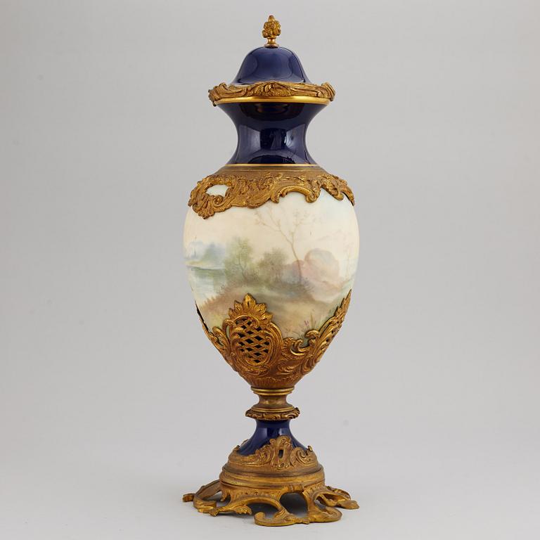 A bronze mounted porcelain vase, Sevres like mark, mid 20th Century.