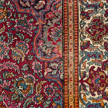 A semi-antique Mobarakeh-Esfahan rug, ca 215 x 137 cm.