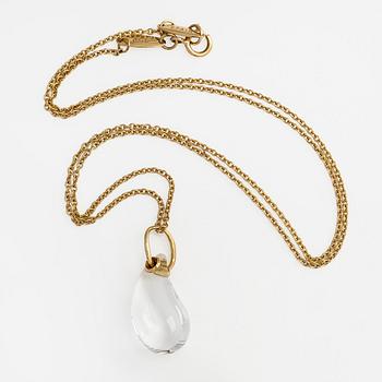 Tiffany & Co, Elsa Peretti, an 18K gold "Teardrop" necklace with a rock crystal pendant.
