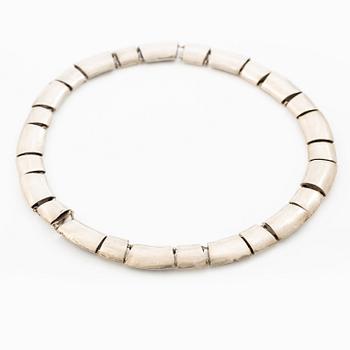 Silver necklace.