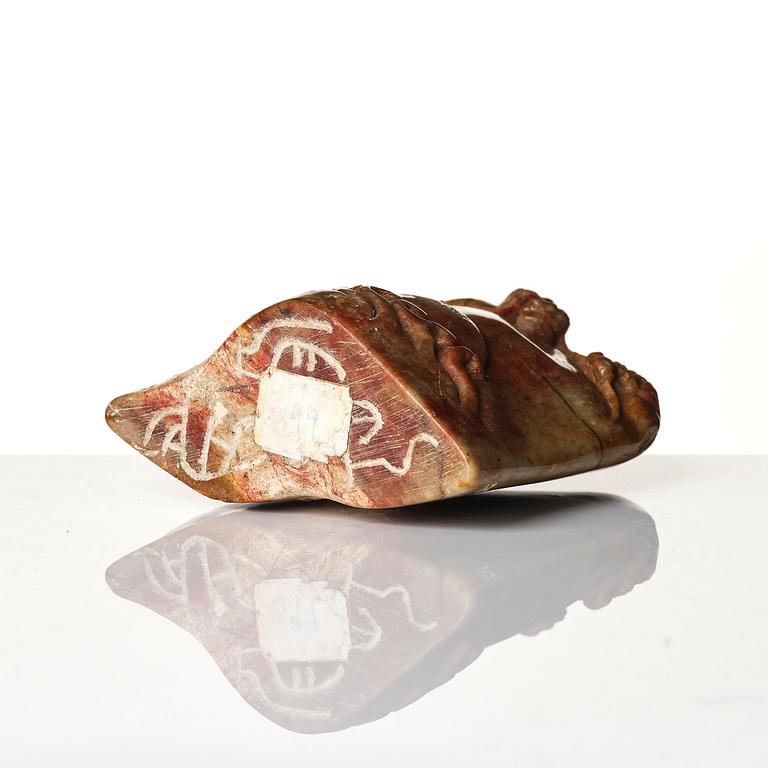 A group of carved nephrite and jade ornaments, China, Qing dynasty and older. (8 pieces).