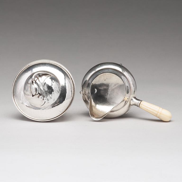 Georg Jensen, a "Blossom" sugarbowl and creamer, Copenhagen 1919-21, 830/1000 silver.