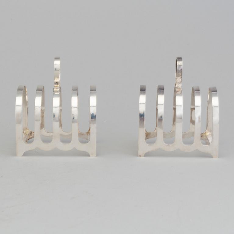 A pair of silver toast racks by Robert F. Mosley, Sheffield, England 1944.