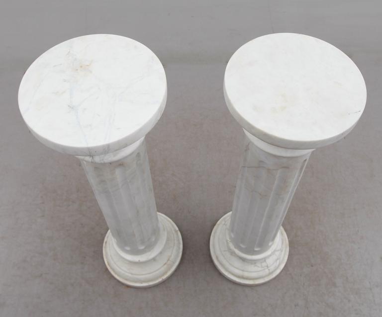 PIEDESTALER, 1 par, marmor, 1900-talets andra hälft.