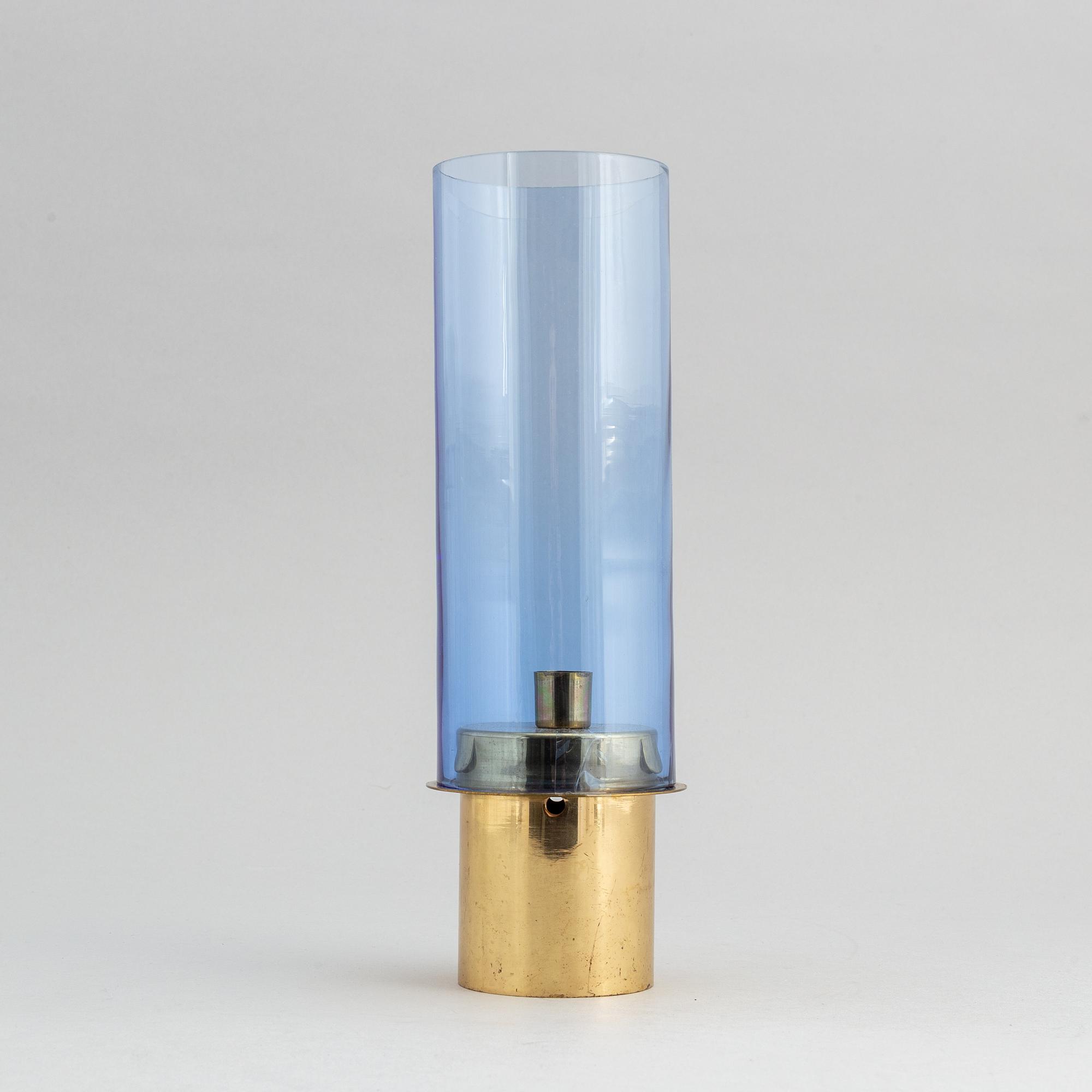 Hans-Agne Jakobsson, a brass and glass candle holder from Markaryd.