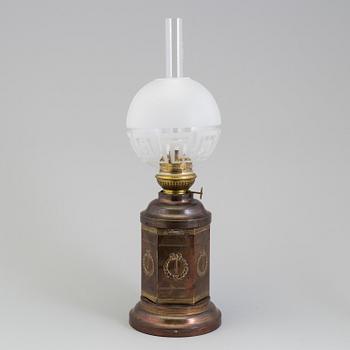 A COPPER OIL LAMP, ca 1900.