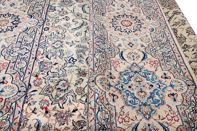A Nain carpet, part silk, 6 laa, c. 453 x 298 cm.